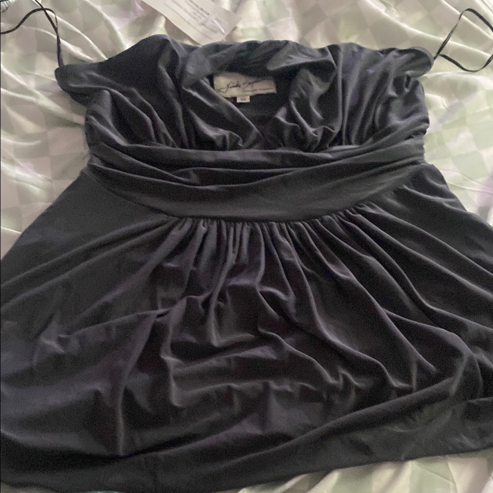 Elegant Black Blouse by [Brand]